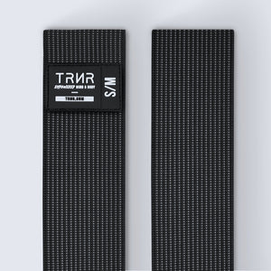 TRNR Stretch Band S/M | Close-Up of Webbing and Label